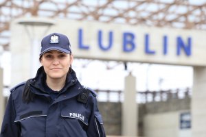 Policjantka w tle napis Lublin.