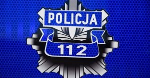 logo Policji z numerem 112 na niebieskim tle