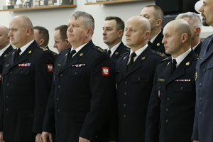Funkcjonariusze Straży Pożarnej podczas spotkania Wigilijnego.