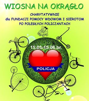 plakat akcji charytatywnej Wiosna na okrągło. Na żółtym tle zielona kula, a w niej czerwone serce. Na około kuli są pojazdy napędzane siła mięśni.