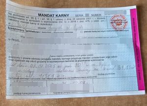 mandat karny za kradzież sklepową