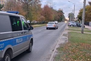 radiowóz zabezpieczający miejsce zdarzenia drogowego