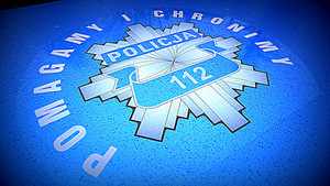 gwiazda policyjna z napisem pomagamy i chronimy