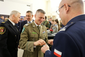 uczestnicy spotkania opłatkowego służb mundurowych na SALI